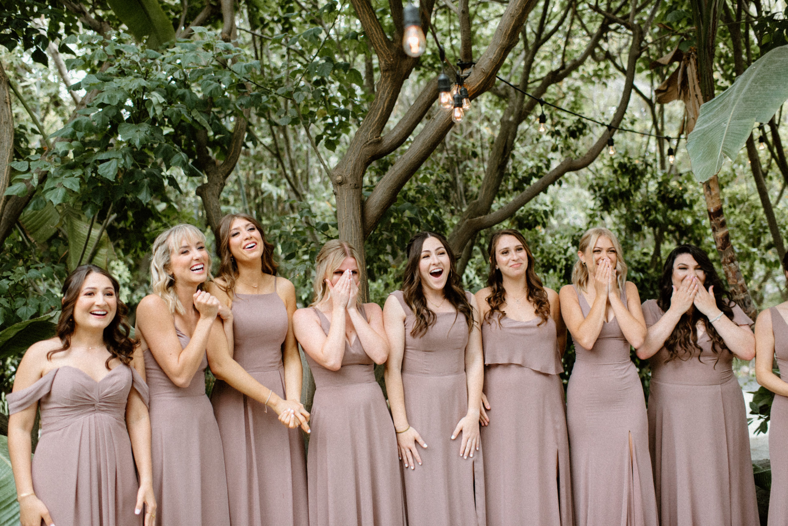 The bridesmaids seeing the bride for the first time! 