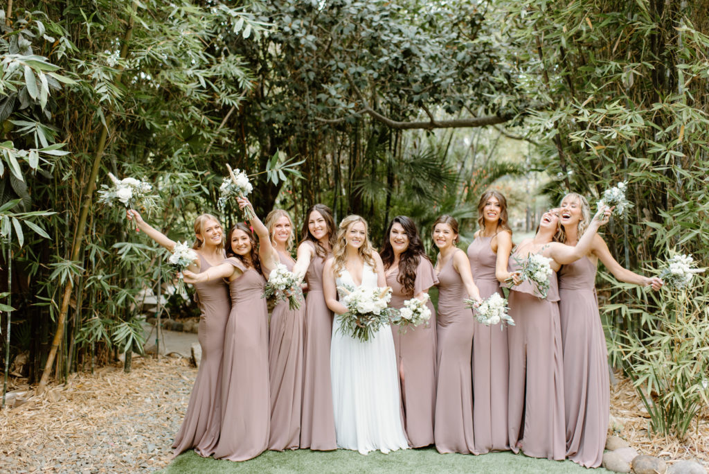 The bridal party having fun before the wedding ceremony at the Botanica Oceanside.
