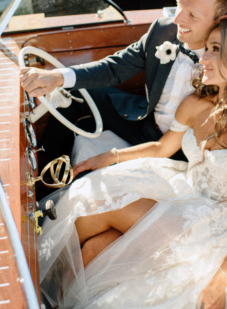 Bride and groom portraits in a boat on Lake Arrowhead