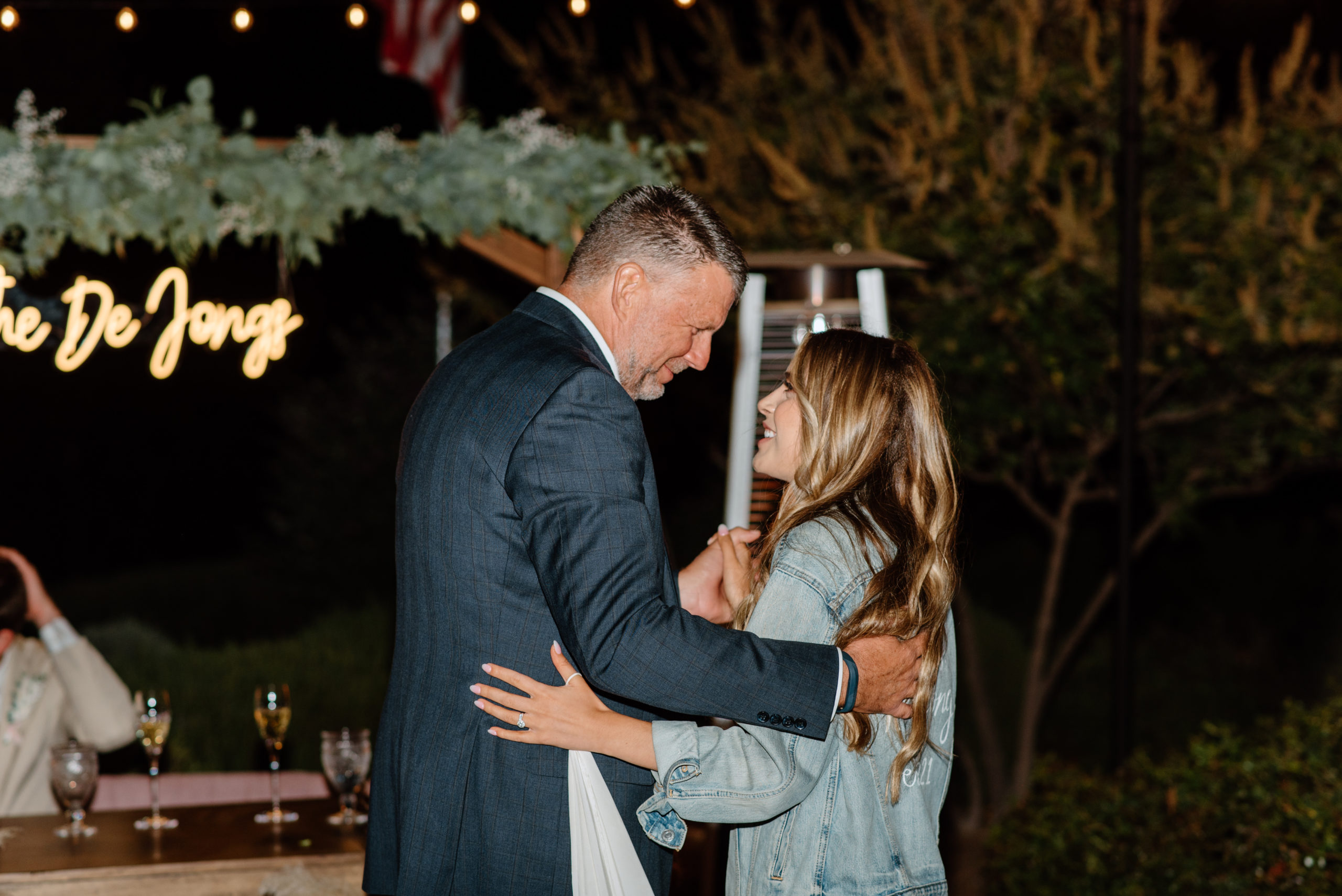 The bride dancing with her dad during the wedding reception