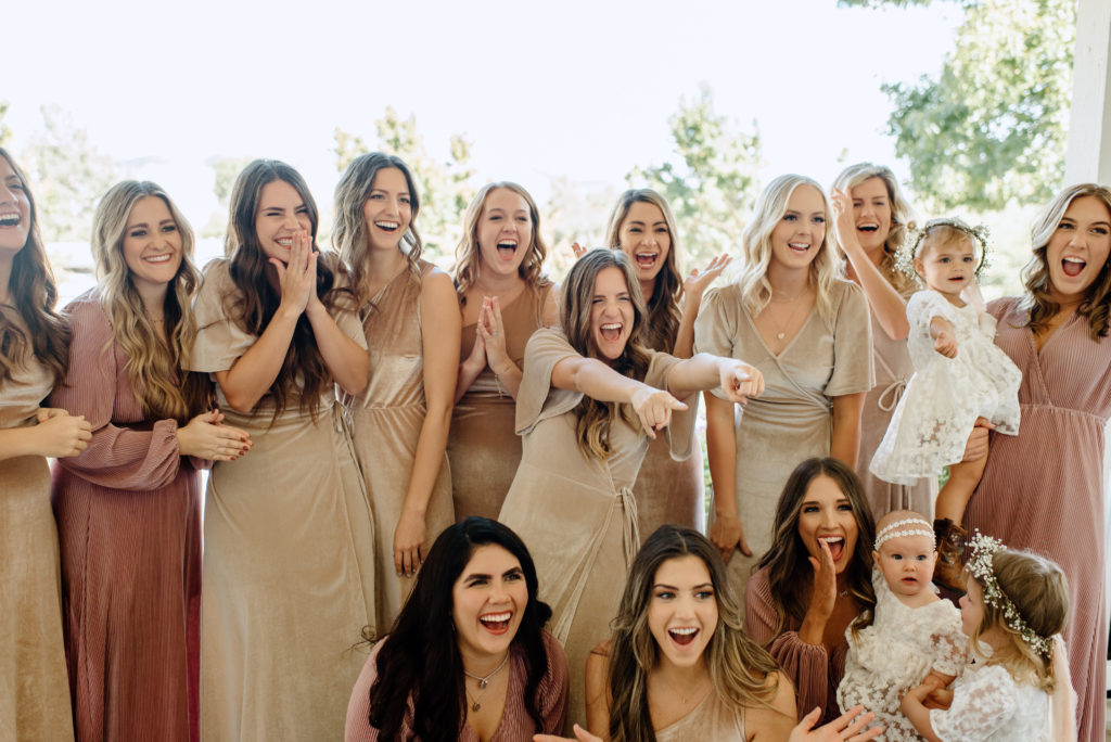 The bridesmaids seeing the bride for the first time