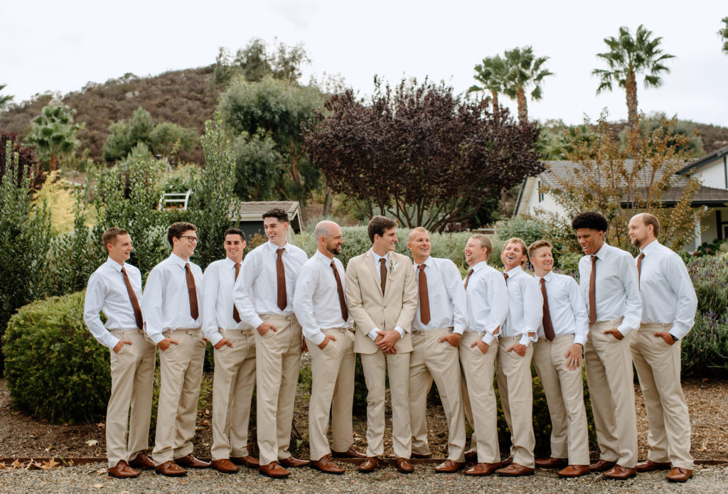 The groom and his groomsmen before the backyard wedding ceremony in Temecula