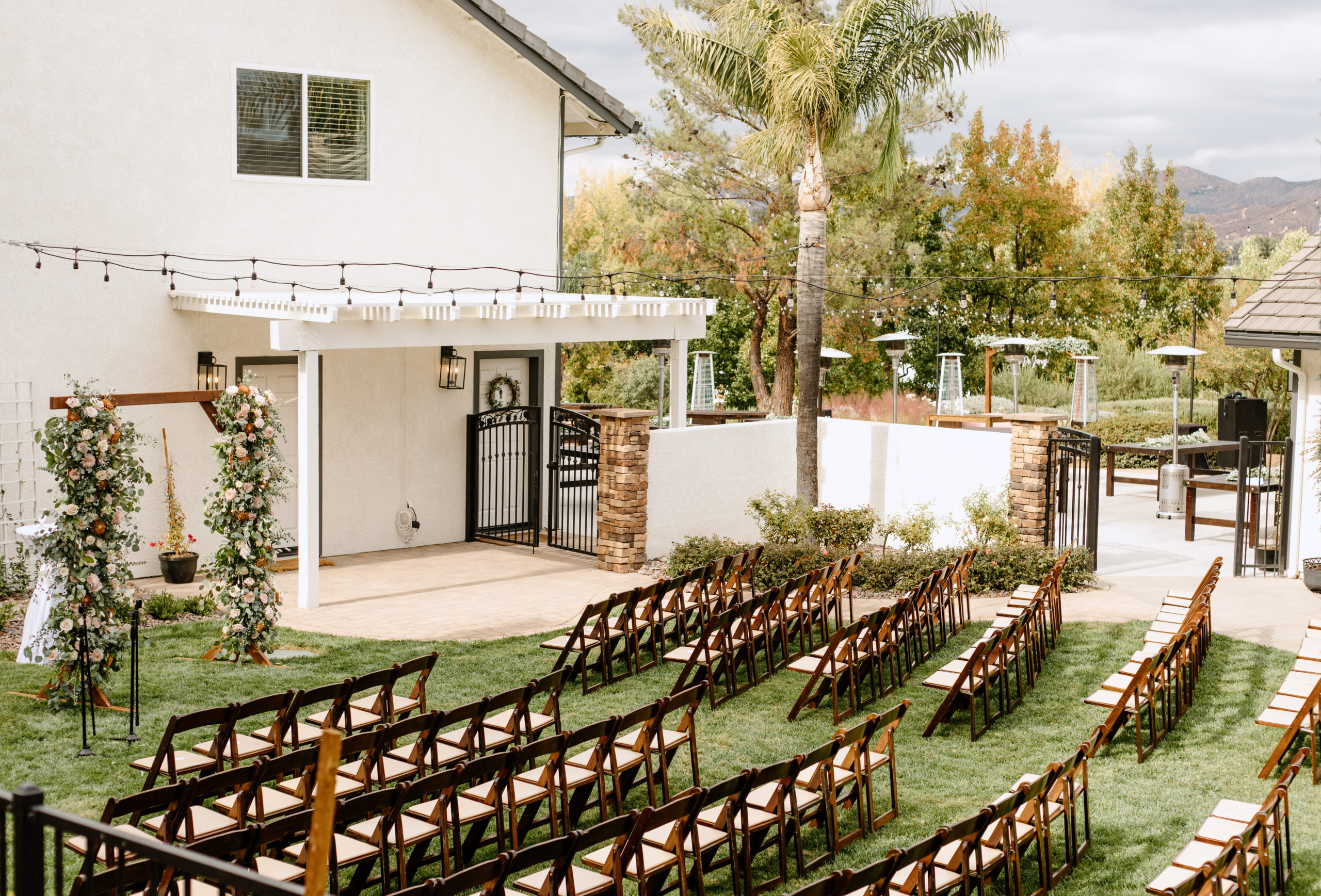 The ceremony site set up all cute in the backyard in Temecula