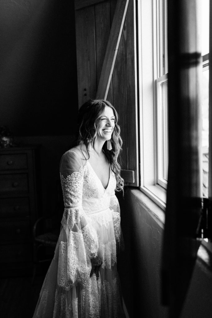 The bride getting ready for her wedding day in the bridal suite at Spruce Mountain Ranch