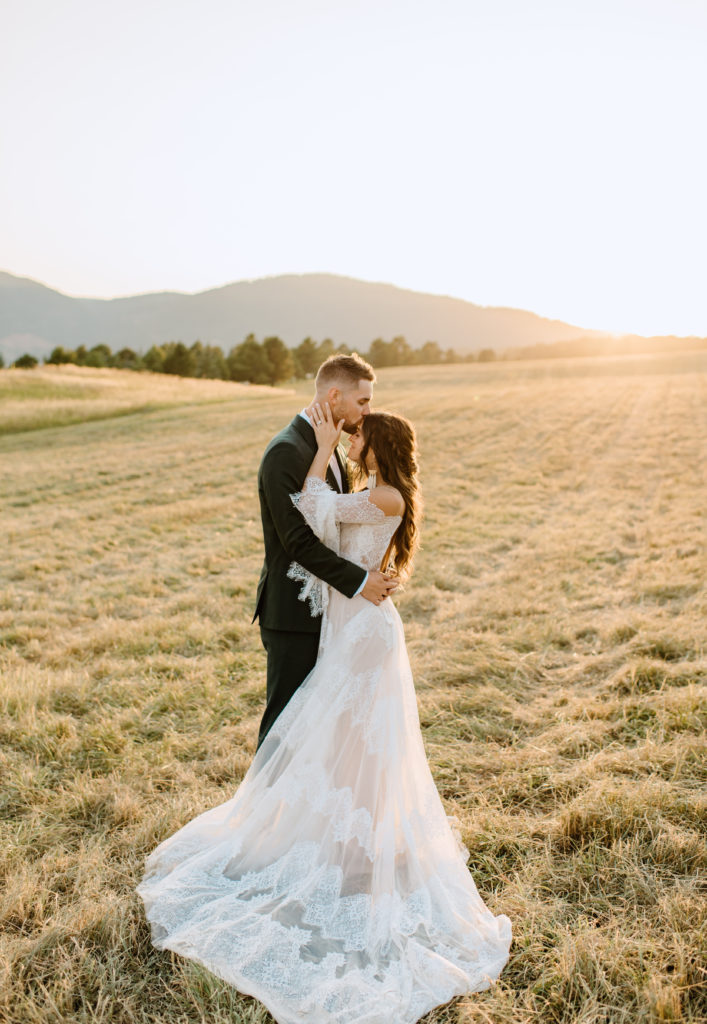 Bride and groom portraits outside around Spruce Mountain Ranch