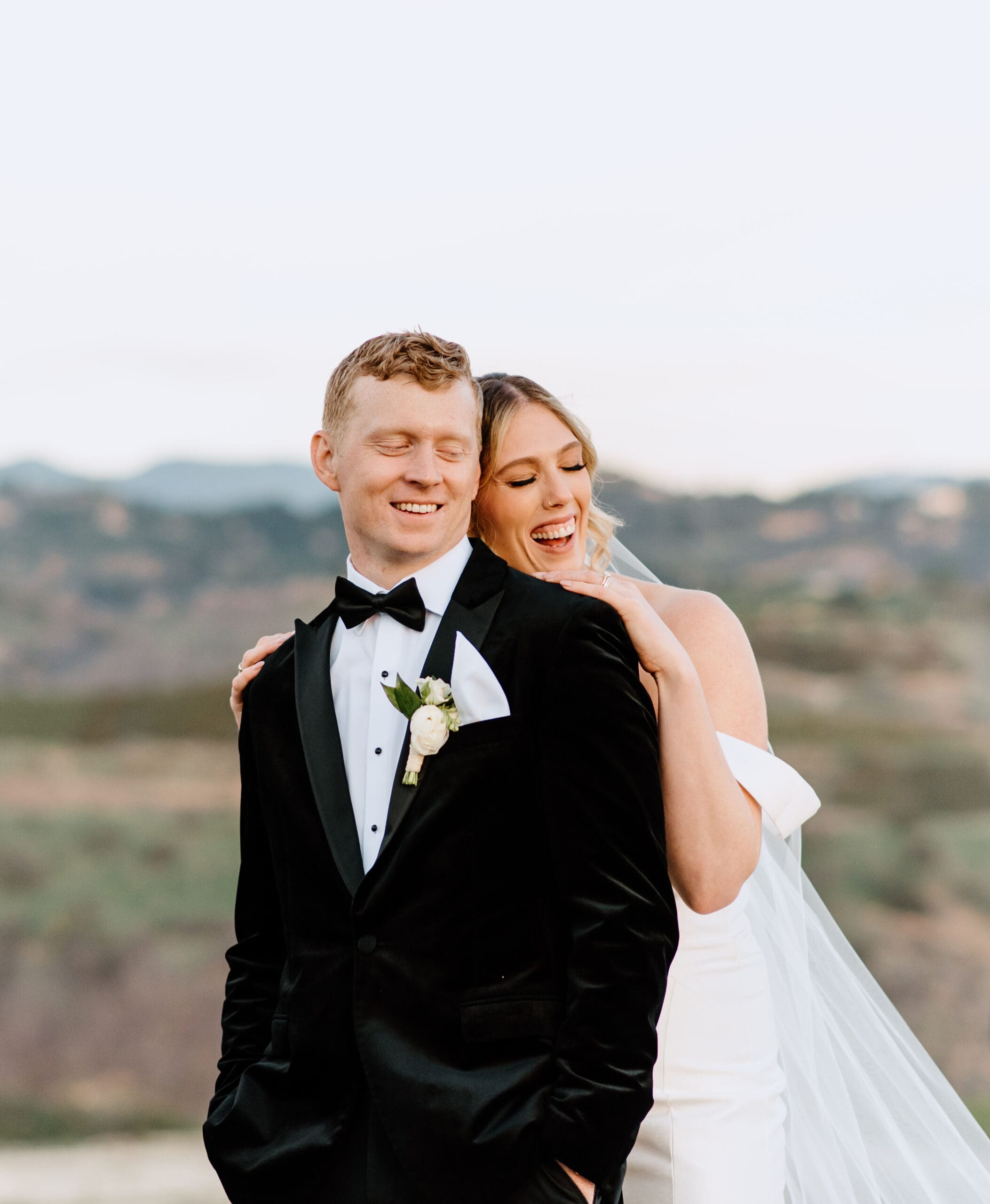 Bride and Groom laughing on their wedding day at Tivoli Italian Villa