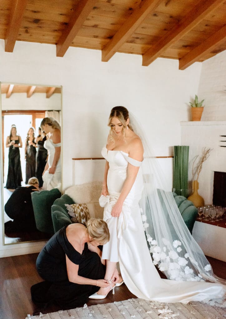 Bride getting ready for her wedding day inside Tivoli Italian Villa