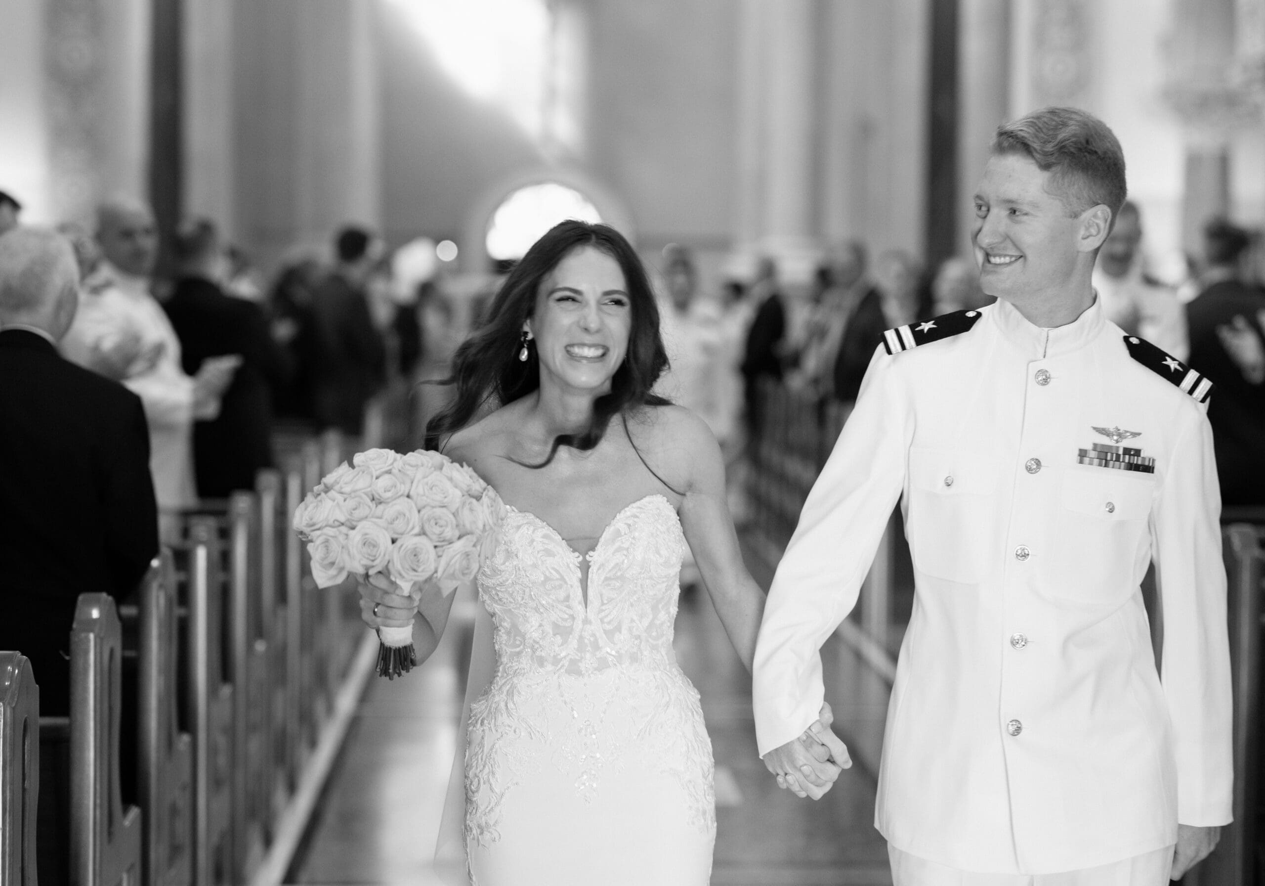 The newly weds walking down the aisle