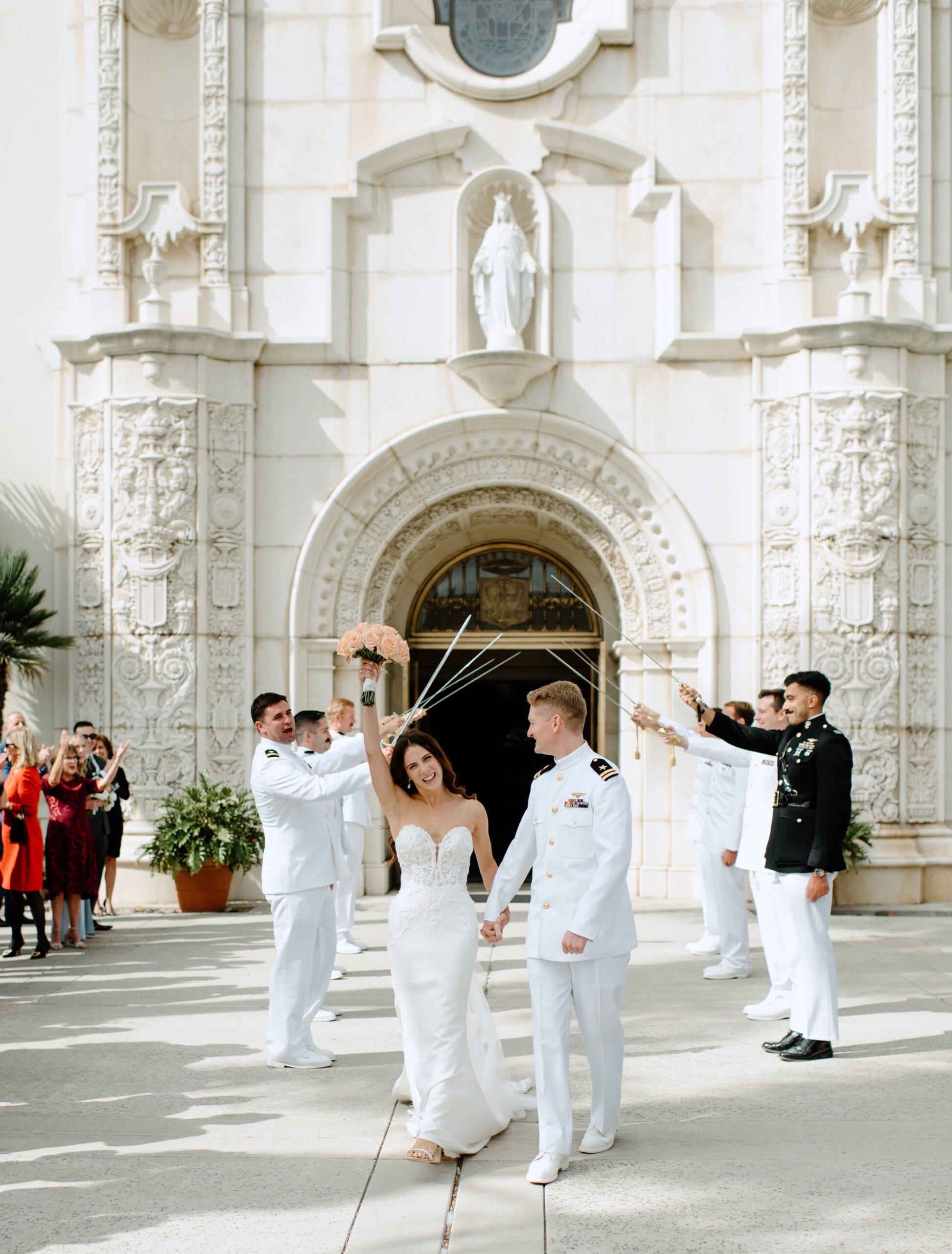 The bride and groom walking out of the church together after the ceremony 