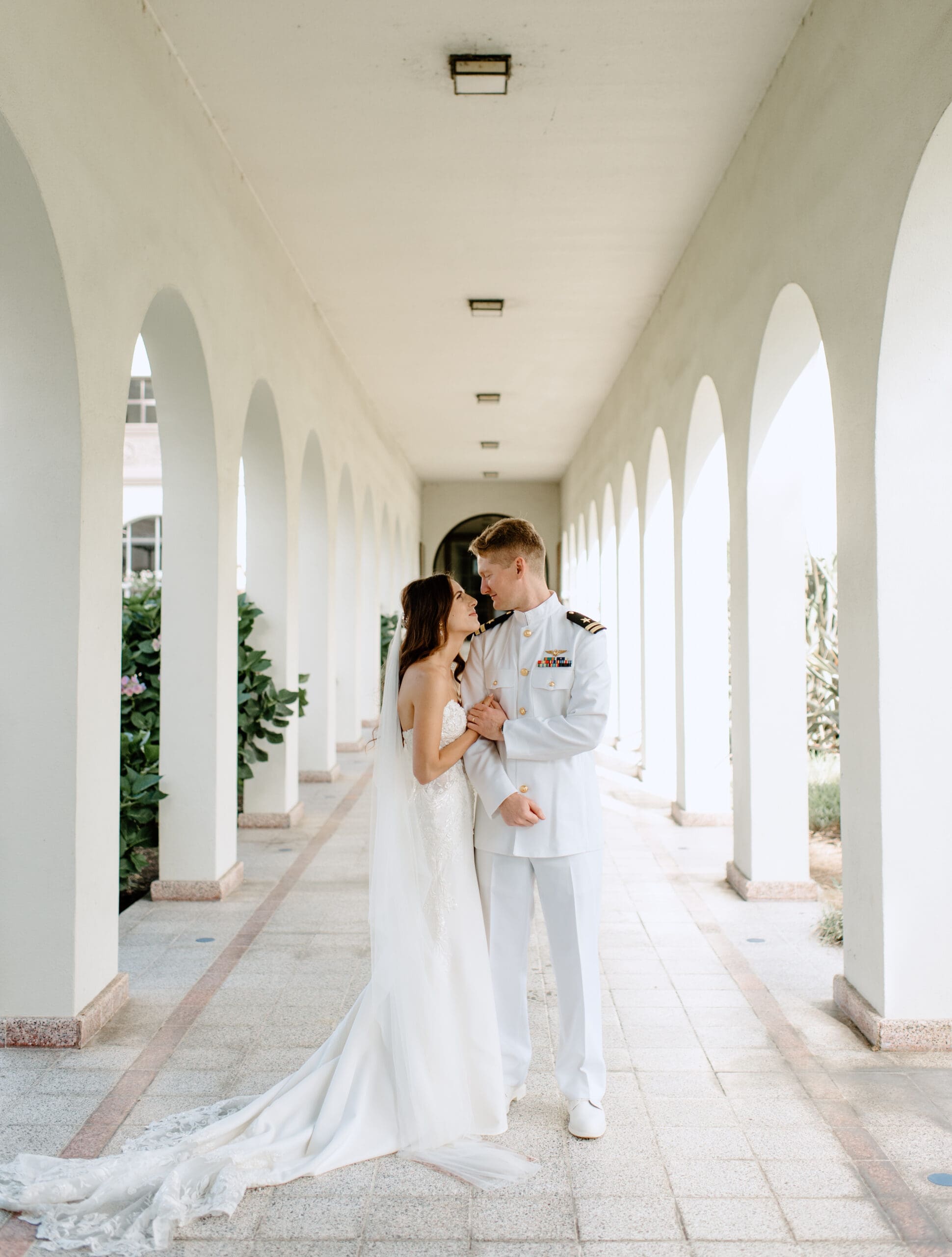 The bride and groom looking at each other during portraits